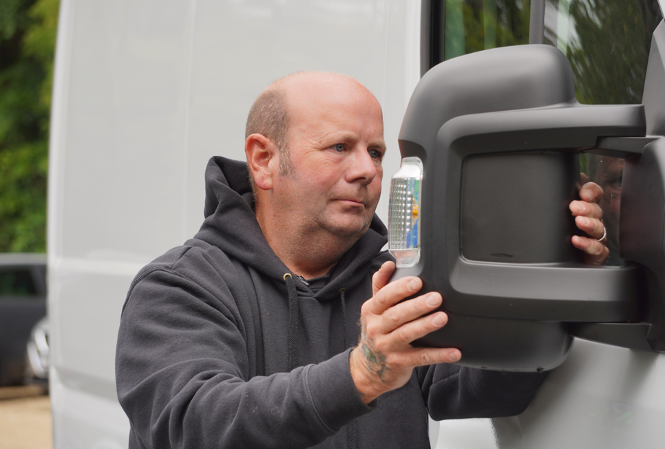 Mobile Repair Solutions at Your Doorstep Mobile technician replacing wing mirror of van